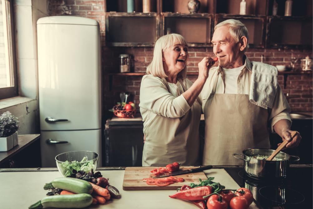 Couple cooking dinner together