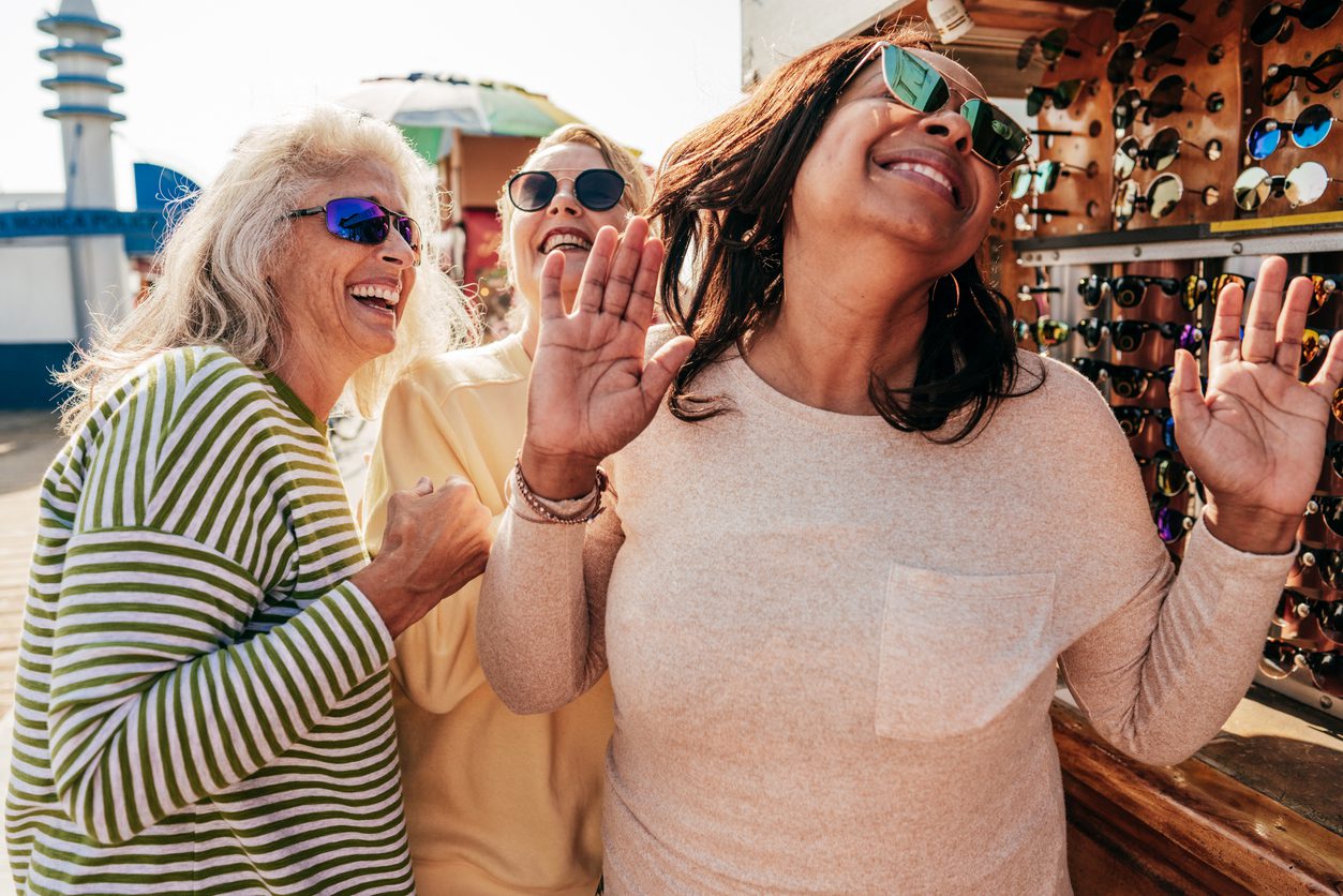 3 women exploring Conway, SC buying sunglasses